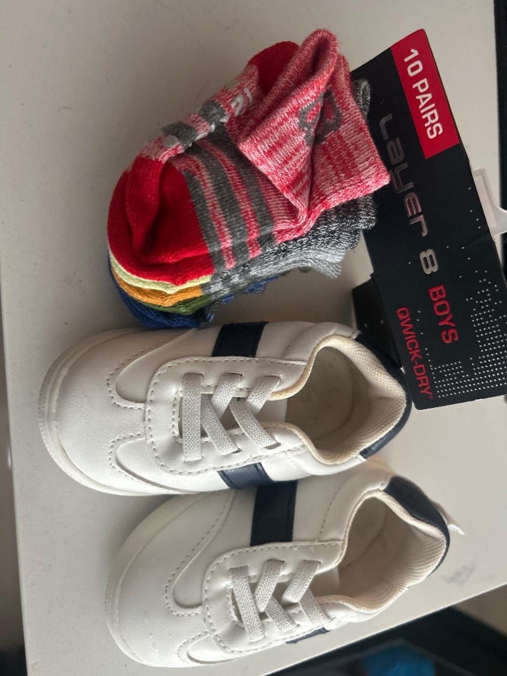 Shoes and 5 pairs of socks.